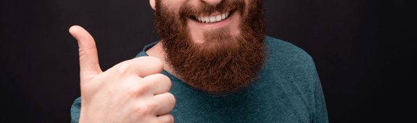 Thumbs up from bearded man